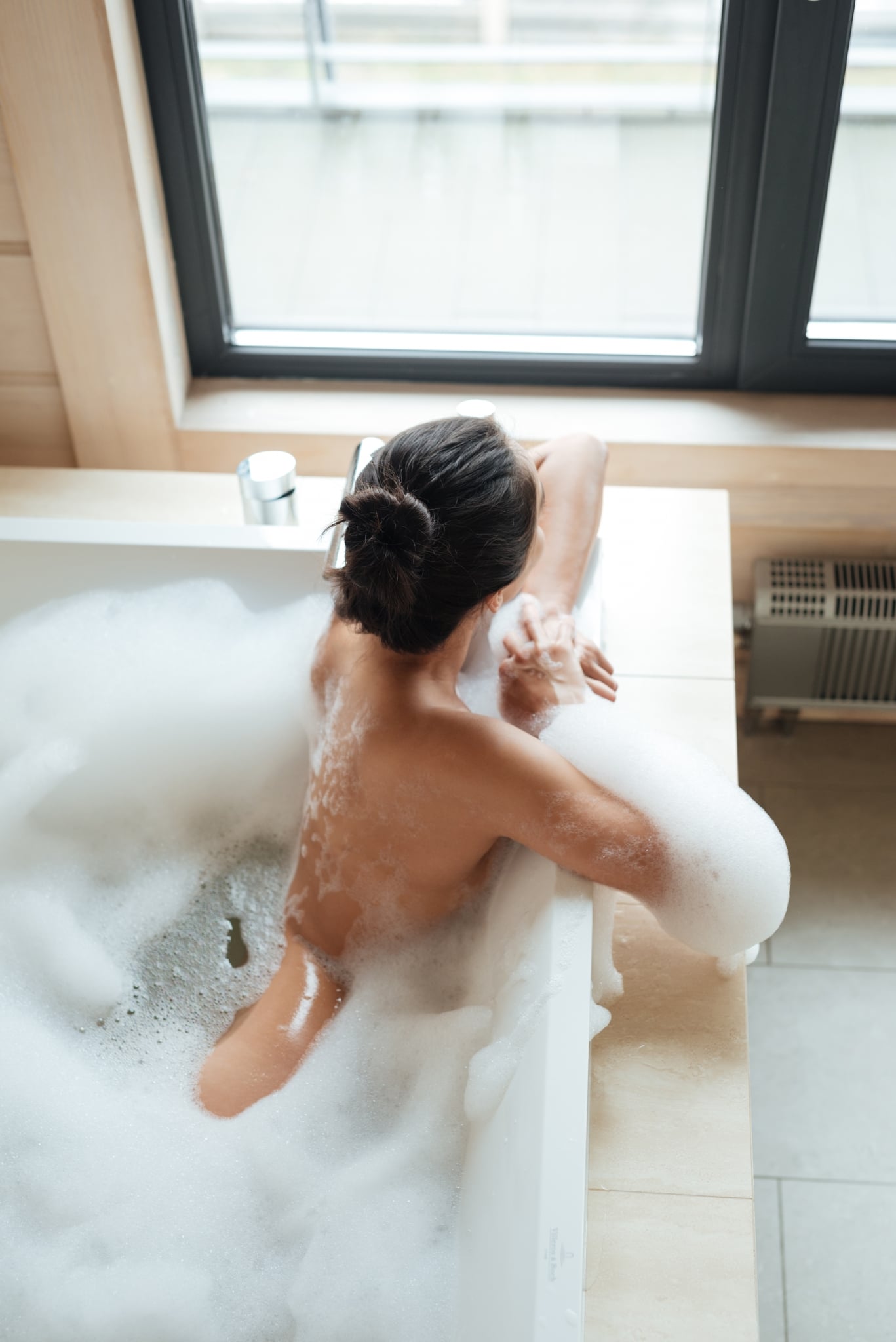 attractive naked young woman sitting in bathtub PR4NMR4