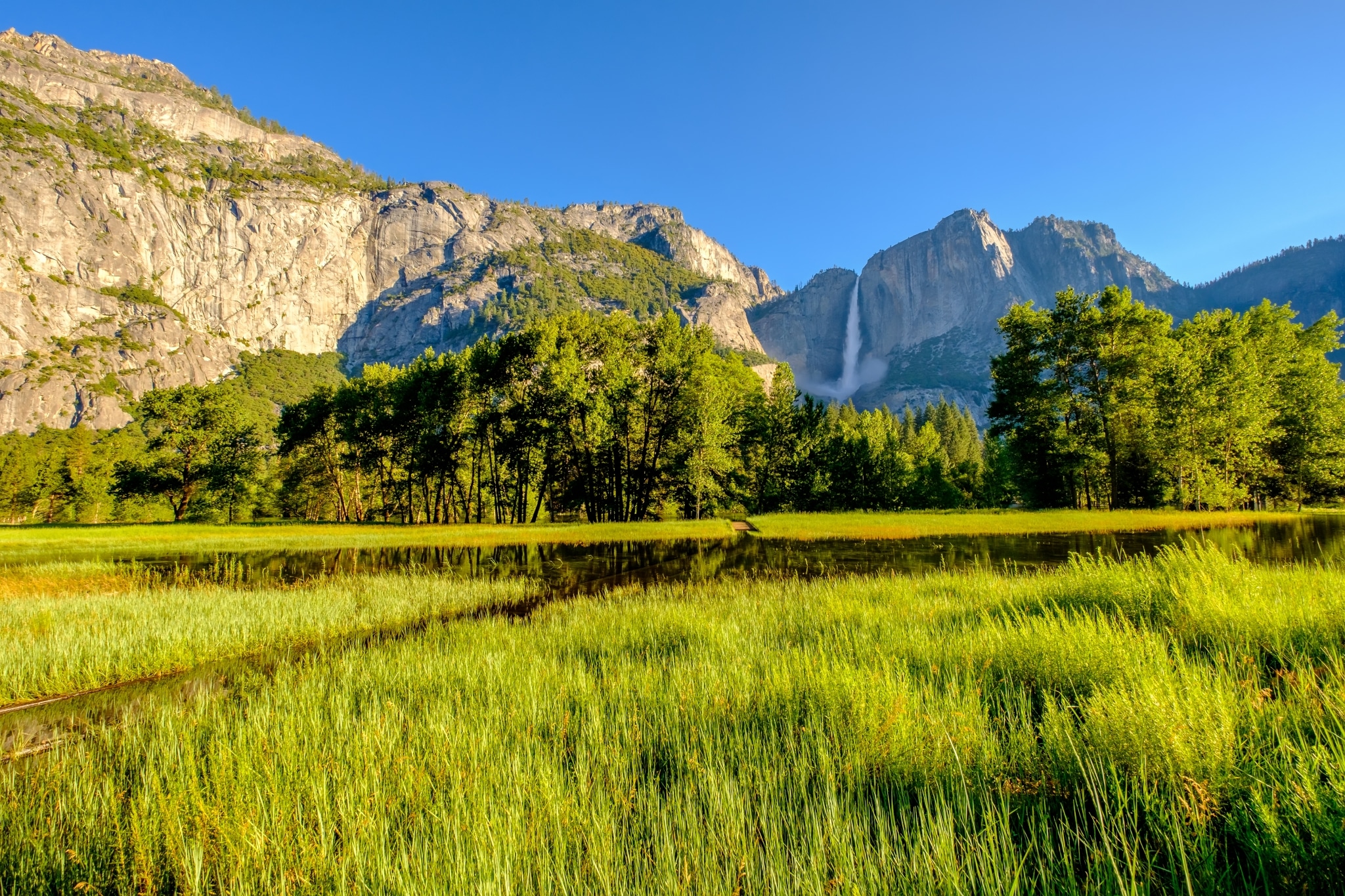 meadow with flooded boardwalk and yosemite falls PWGYWUS